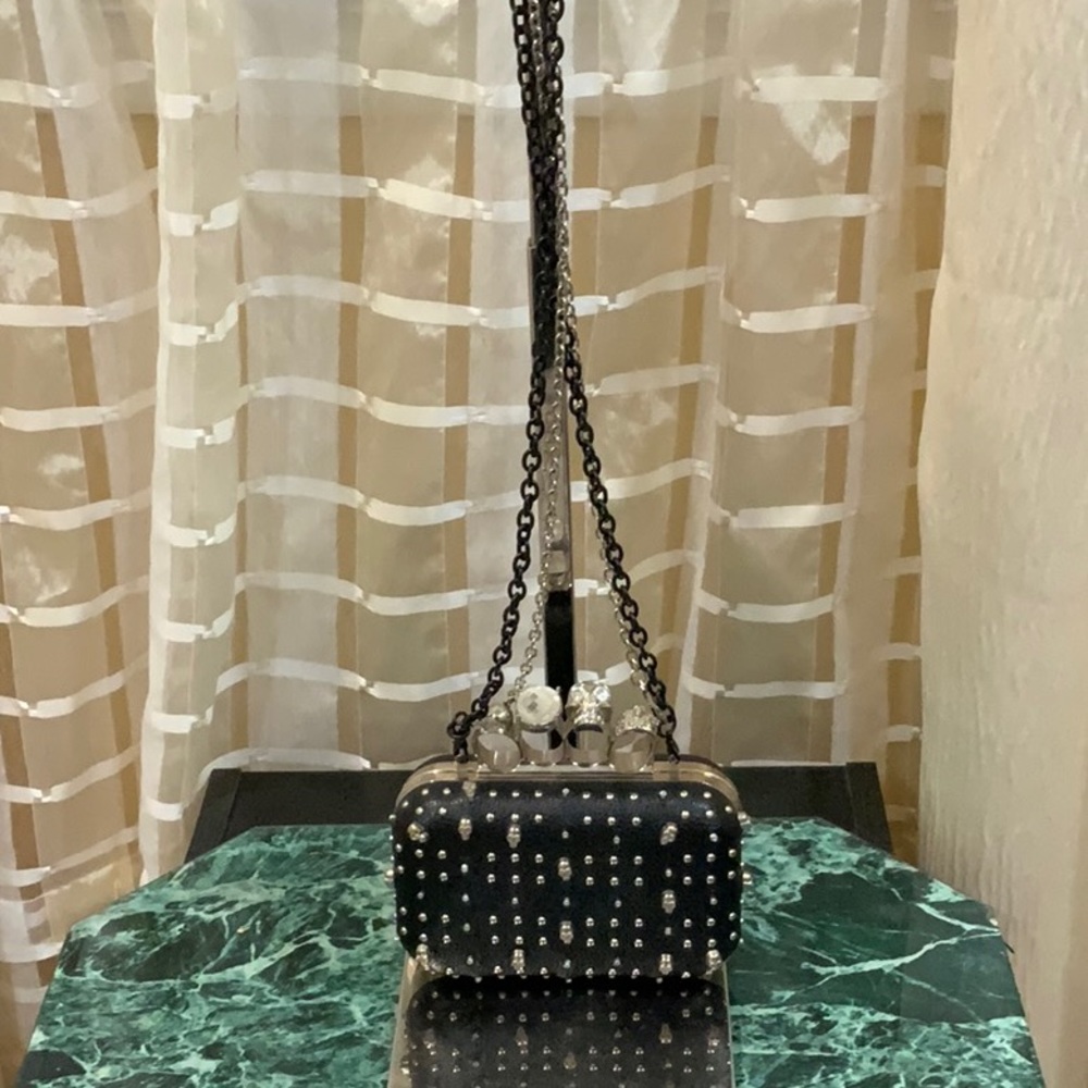 Black coctale  crossbody bag with scull and rings